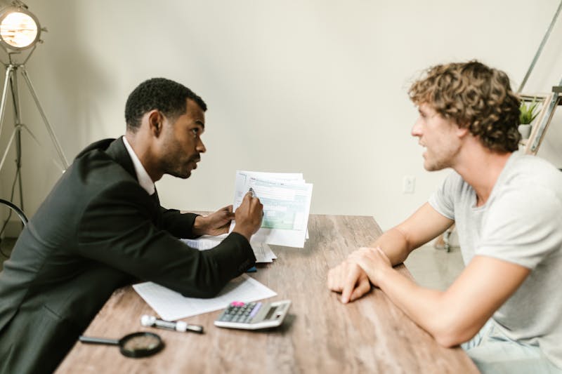 Financial advisor meeting with individual client