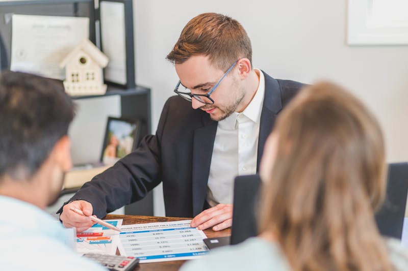 Tax advisor presenting documents to client